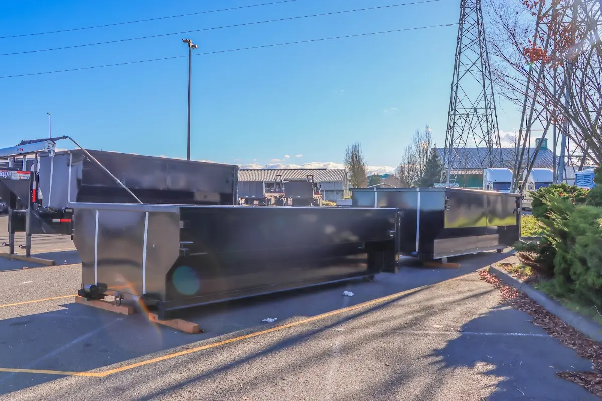 Roll-off dumpster ready for waste disposal at job site for Concrete Dumpster Rental in Odessa